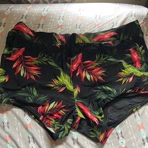 Torrid black tropical print dolphin hem swim shorts. Size 1. EUC.